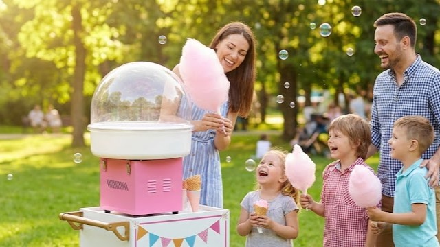 A professional-grade pink commercial cotton candy machine available for event rentals in Murrells Inlet and Myrtle Beach