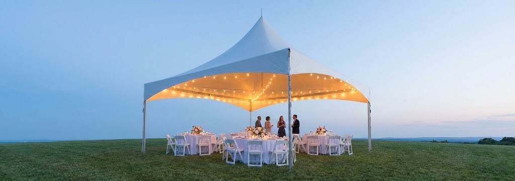 Premium 20x20 high-peak frame tent rental set up for an elegant outdoor wedding or garden party in Myrtle Beach.