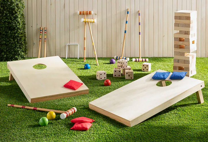A variety of outdoor lawn games for rent including cornhole, giant Jenga, and croquet, perfect for backyard parties and weddings in Murrells Inlet and Myrtle Beach.
