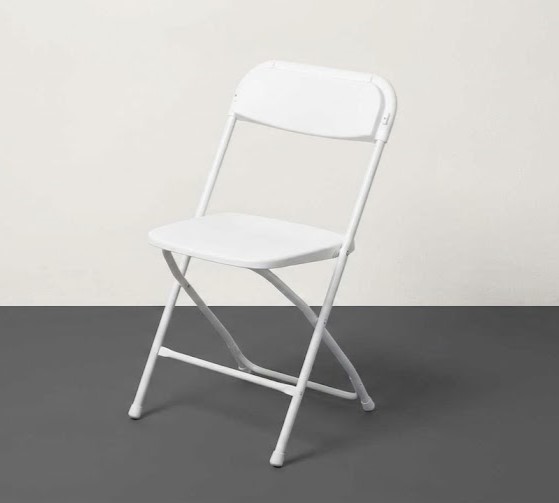 White folding chair with a contoured seat, available for event rentals in Murrells Inlet
